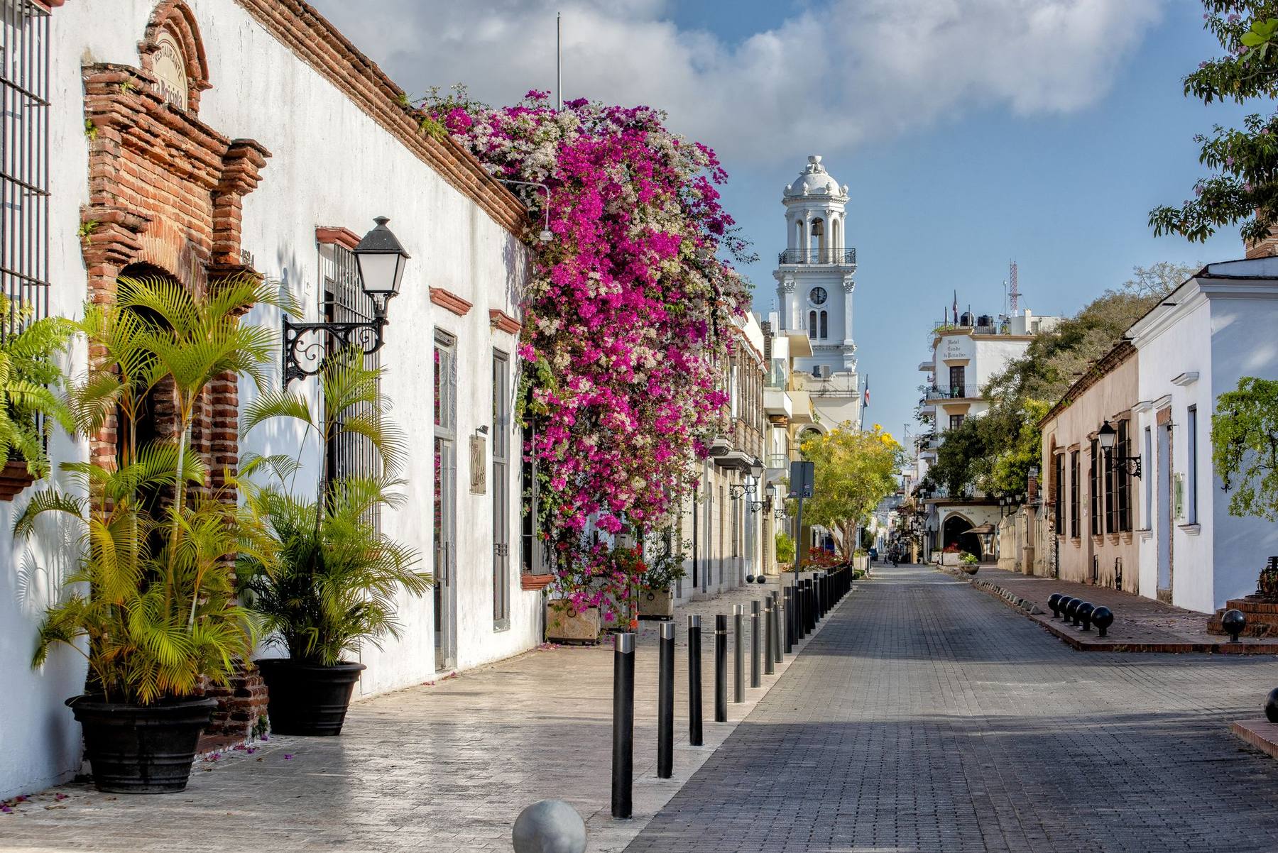 A colonial street with bougainvillea in Santo Domingo