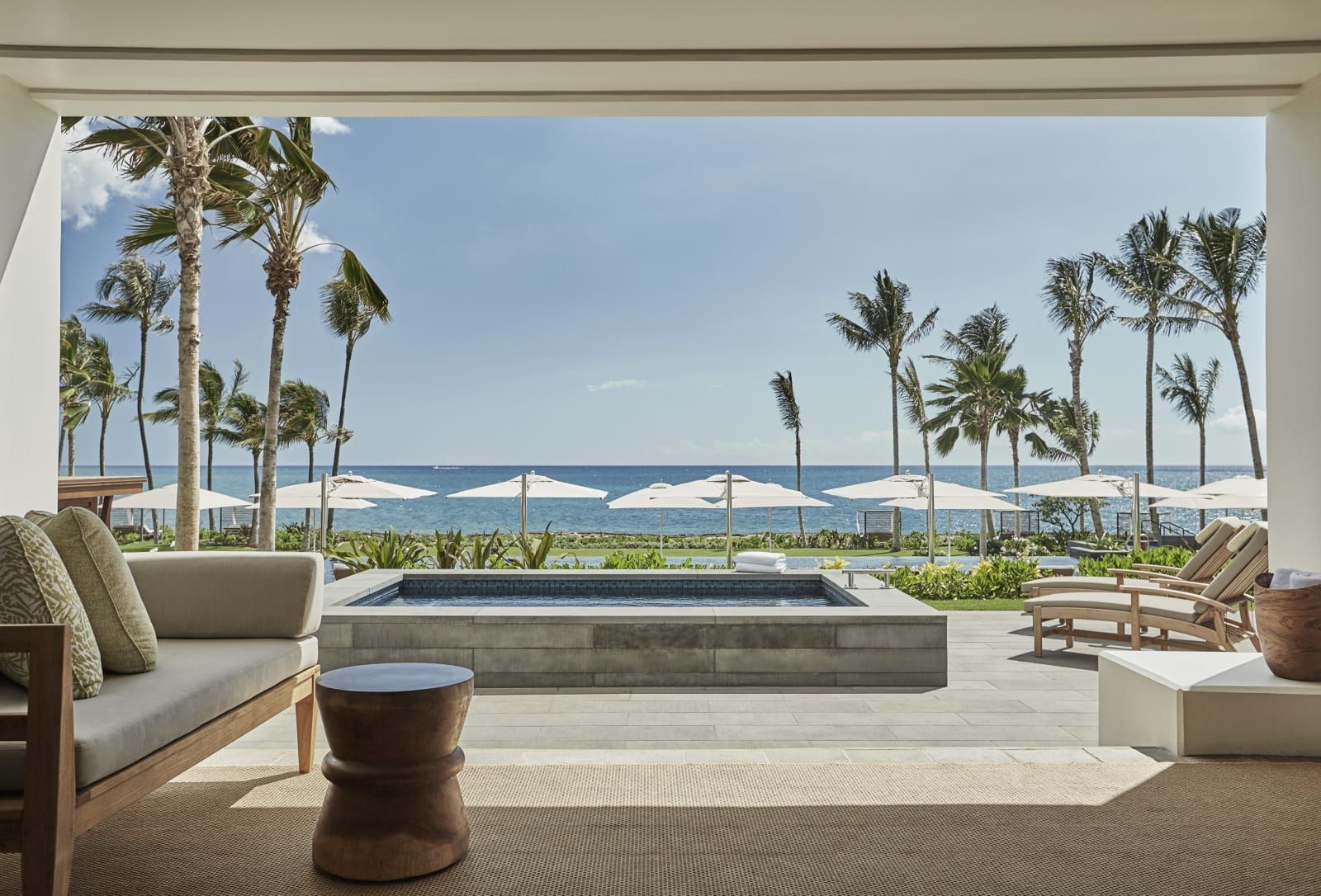 A private lanai with a plunge pool looking out to the beach