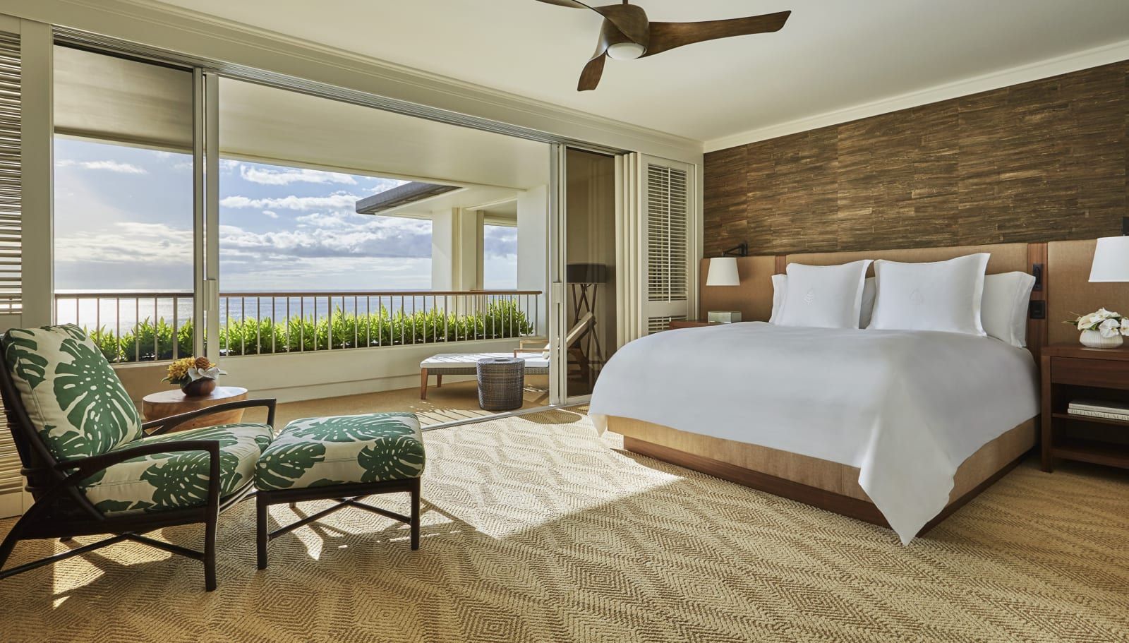 An oceanfront king room opening onto a balcony