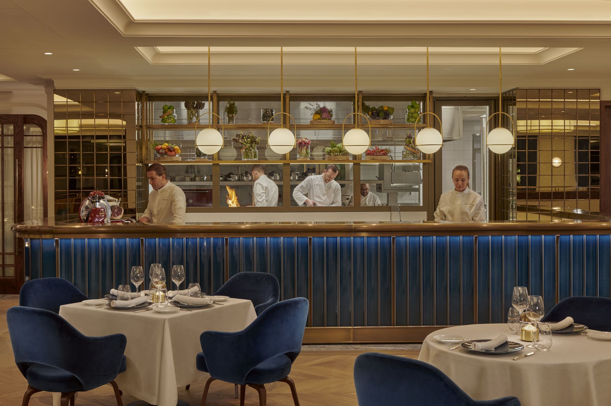 Chefs at work behind the counter at Al Mare