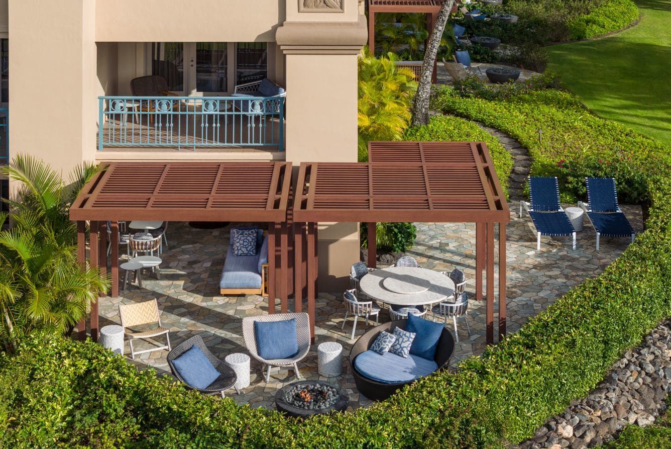 A private terrace with a pergola and garden seating