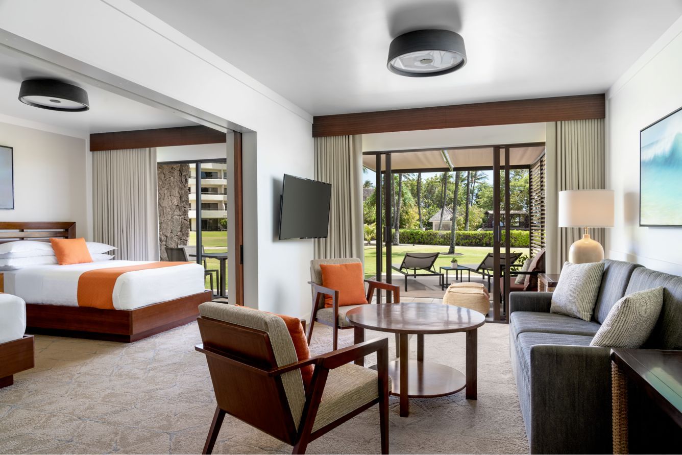A spacious guest room opening onto the garden