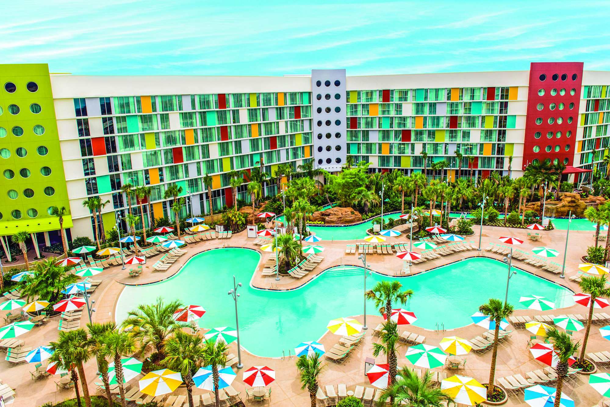 Aerial view of the pool and bright retro towers at Universal Cabana Bay Beach Resort