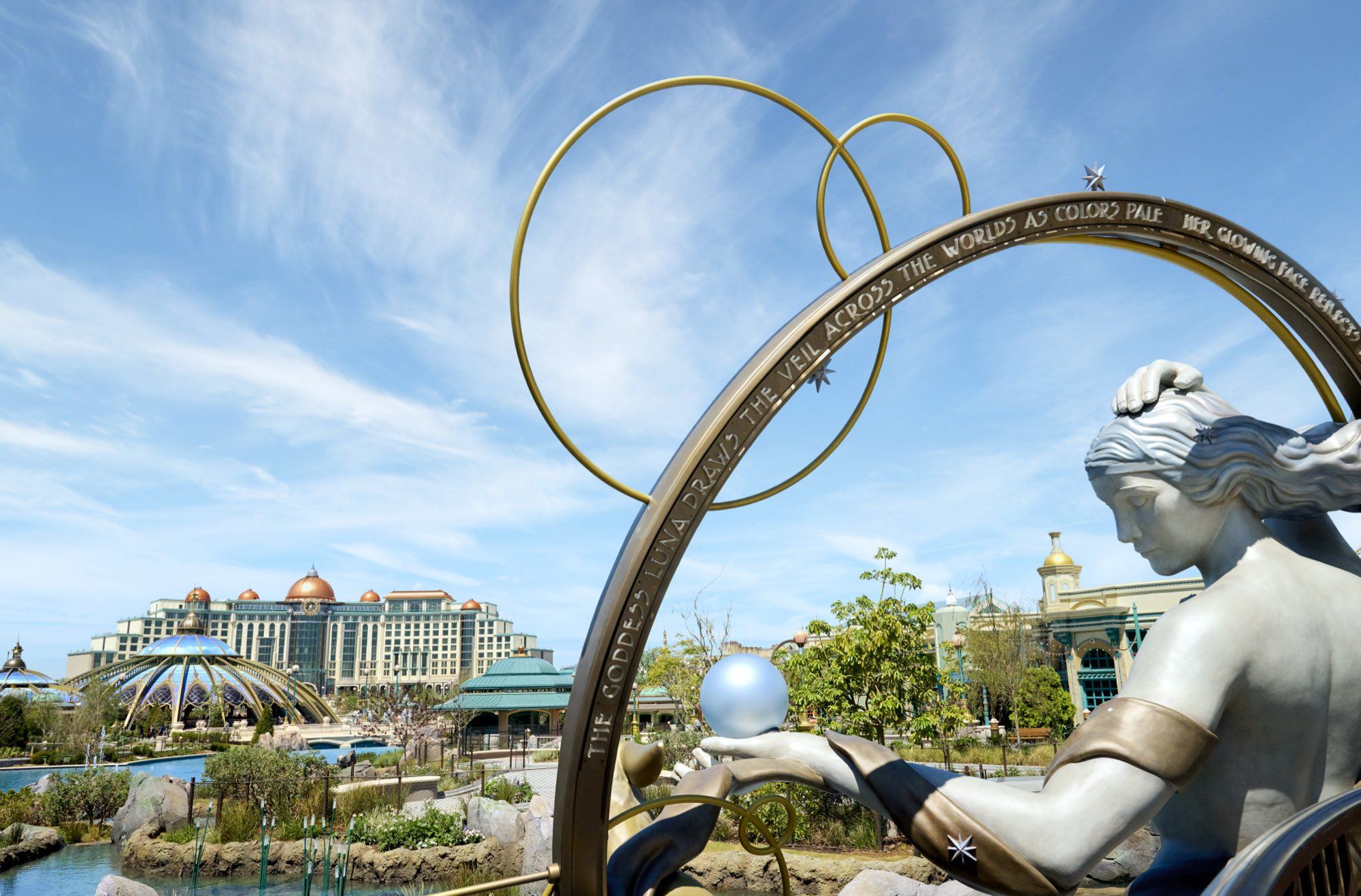 A celestial sculpture in Celestial Park, with Universal Helios Grand Hotel beyond